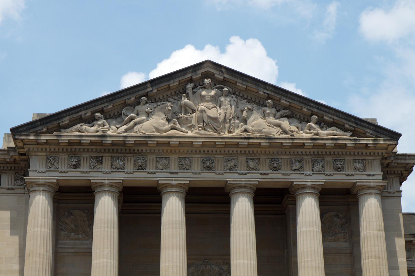 Columns and a carved pediment on a federal government building in Washington, D.C.